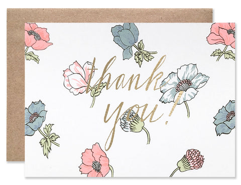 Gold foil thank you with a background of blue and pink poppies. Illustrated by Hartland Brooklyn.
