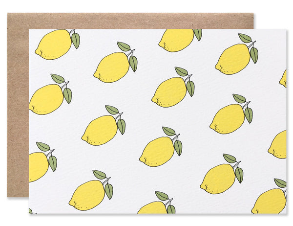 multiple neon yellow whole lemons with green leafs create a pattern all over this card by Hartland Brooklyn.